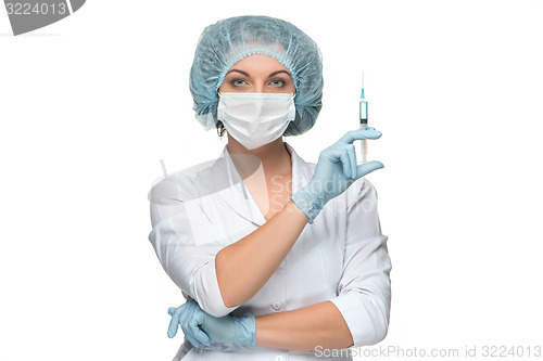 Image of Portrait of lady surgeon showing syringe over white background