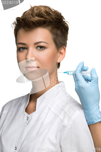 Image of pretty young woman and vaccine syringe