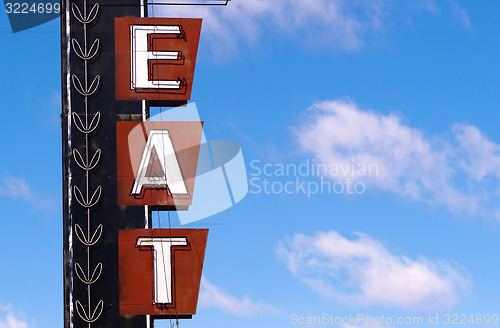 Image of Neon Eat Sign Advertising Food Route 66 Retro Signboard