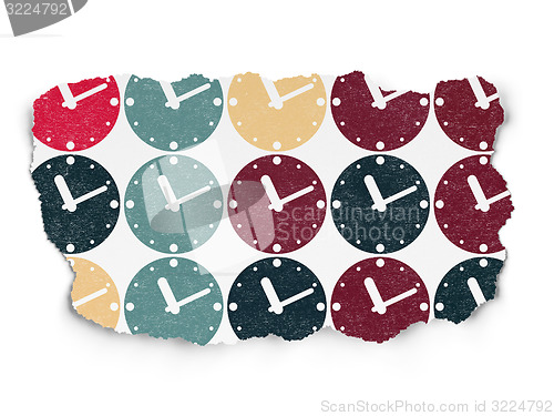 Image of Time concept: Clock icons on Torn Paper background