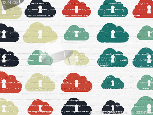 Image of Cloud networking concept: Cloud With Keyhole icons on wall background