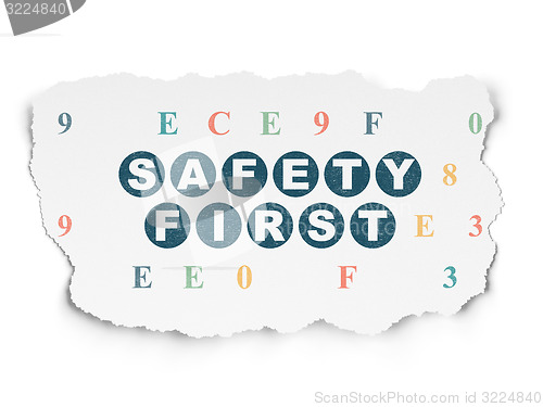 Image of Security concept: Safety First on Torn Paper background