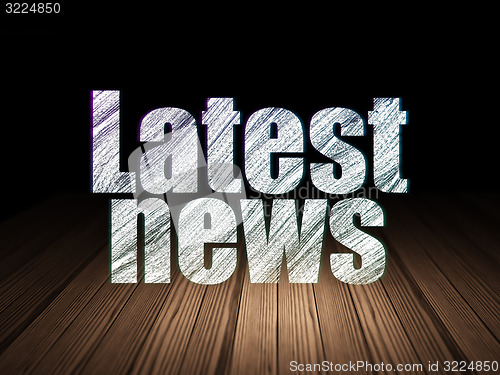 Image of News concept: Latest News in grunge dark room