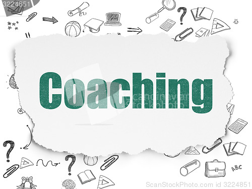 Image of Education concept: Coaching on Torn Paper background