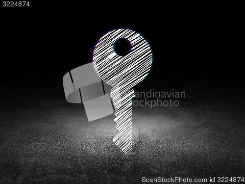 Image of Protection concept: Key in grunge dark room