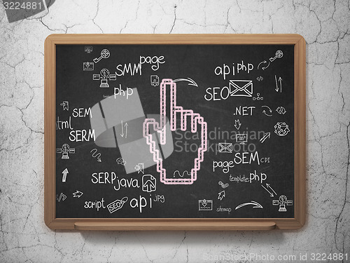 Image of Web design concept: Mouse Cursor on School Board background