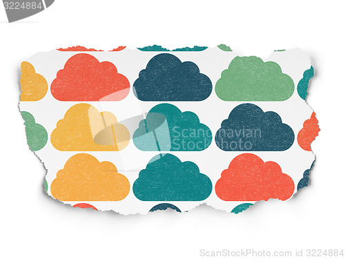 Image of Cloud computing concept: Cloud icons on Torn Paper background