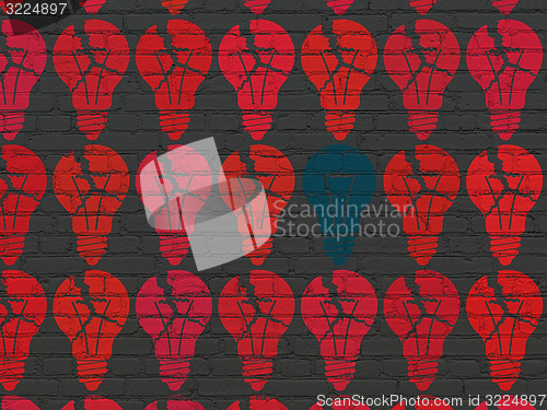 Image of Finance concept: light bulb icon on wall background