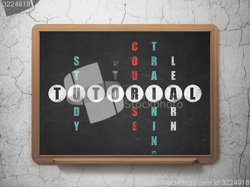 Image of Education concept: word Tutorial in solving Crossword Puzzle