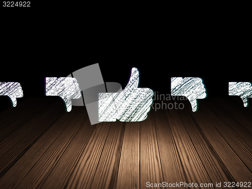 Image of Social network concept: thumb up icon in grunge dark room
