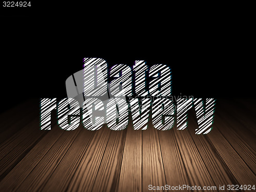 Image of Information concept: Data Recovery in grunge dark room