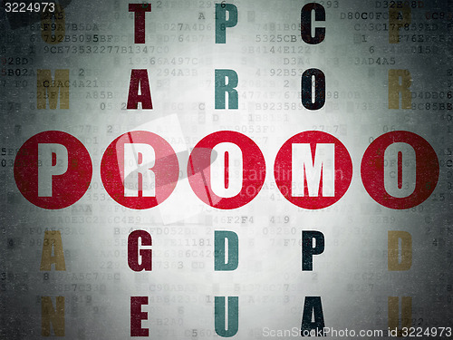 Image of Advertising concept: word Promo in solving Crossword Puzzle
