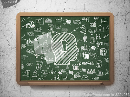 Image of Business concept: Head With Keyhole on School Board background