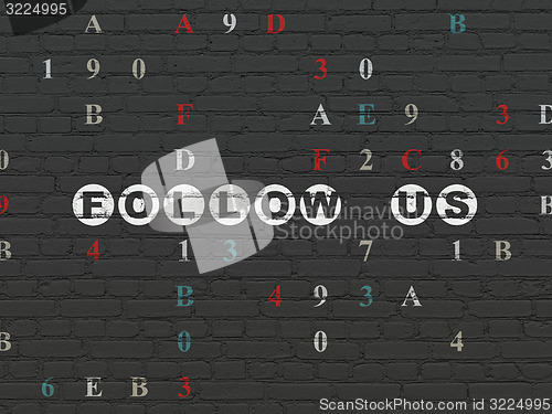 Image of Social network concept: Follow us on wall background