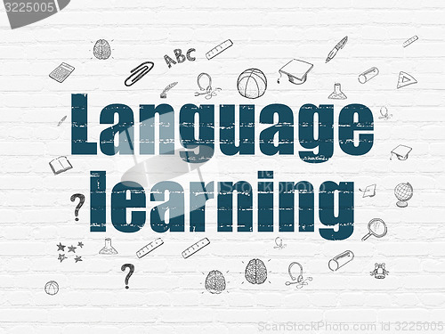 Image of Education concept: Language Learning on wall background