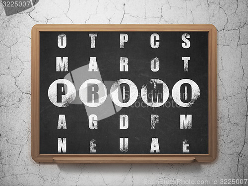 Image of Advertising concept: word Promo in solving Crossword Puzzle