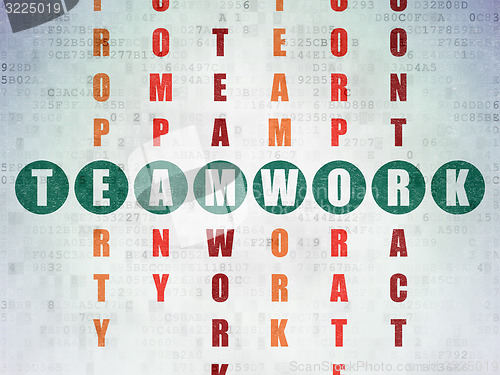 Image of Business concept: word Teamwork in solving Crossword Puzzle