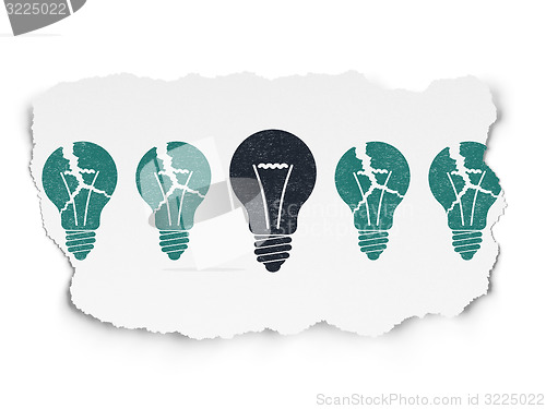 Image of Business concept: light bulb icon on Torn Paper background