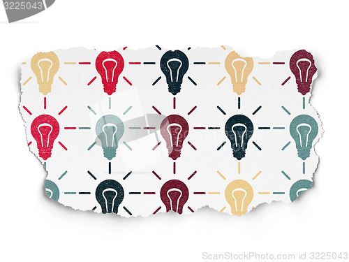 Image of Business concept: Light Bulb icons on Torn Paper background