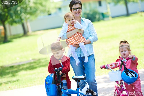 Image of happy young family in park
