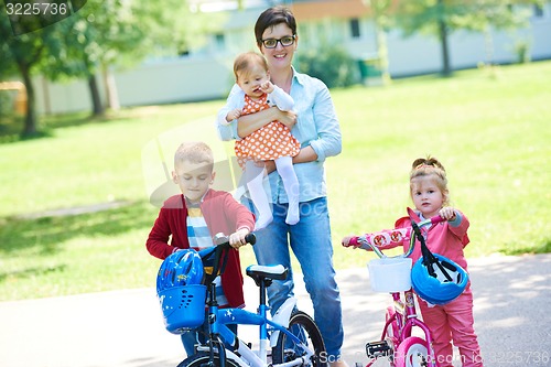 Image of happy young family in park
