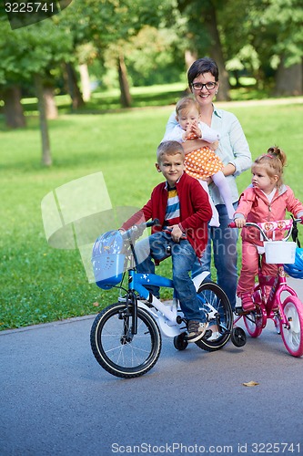 Image of happy young family in park
