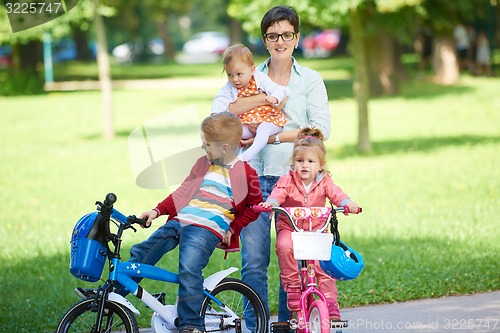 Image of happy young family in park