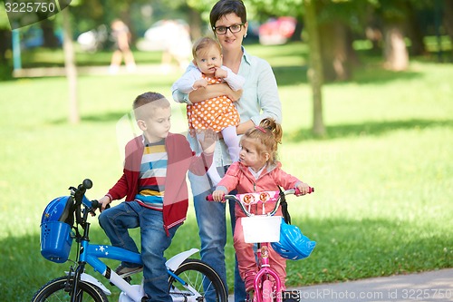 Image of happy young family in park