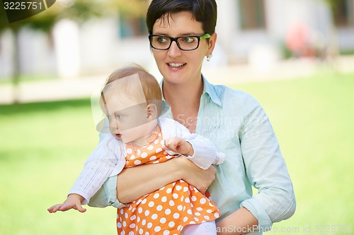 Image of mom and baby in nature