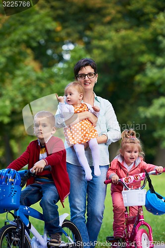 Image of happy young family in park