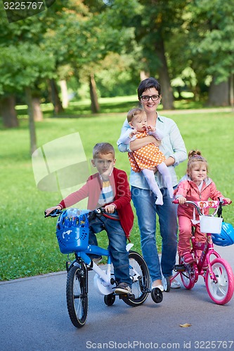 Image of happy young family in park