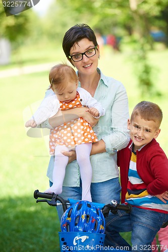 Image of happy young family in park