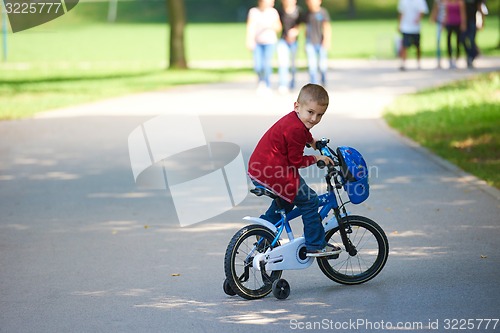 Image of boy on the bicycle at Park