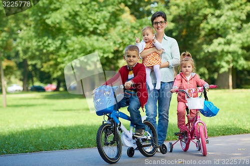 Image of happy young family in park