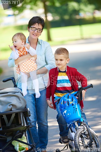 Image of happy young family in park
