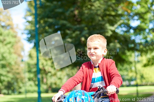 Image of boy on the bicycle at Park