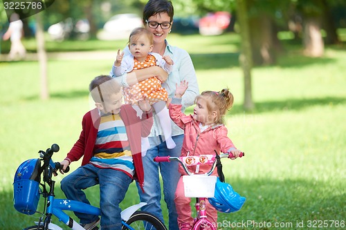 Image of happy young family in park