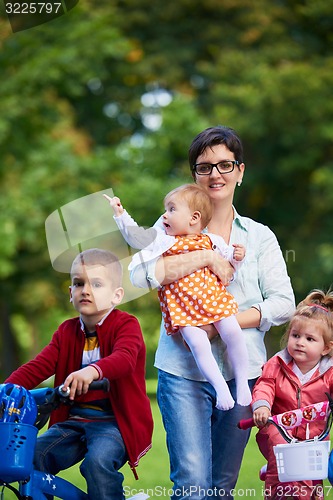 Image of happy young family in park