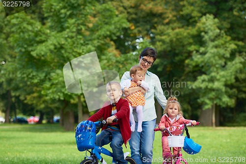 Image of happy young family in park