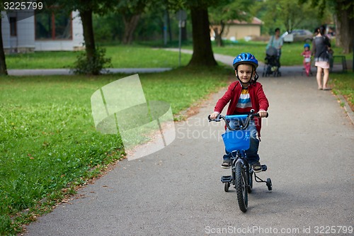 Image of boy on the bicycle at Park