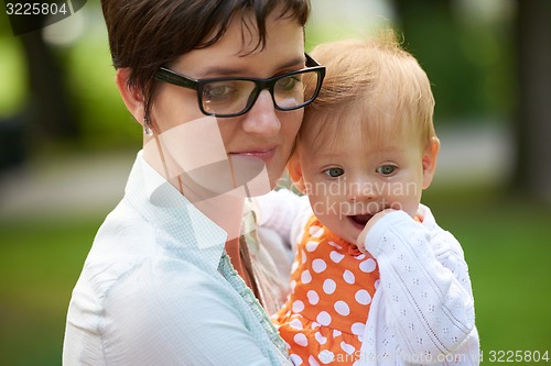 Image of mom and baby in nature