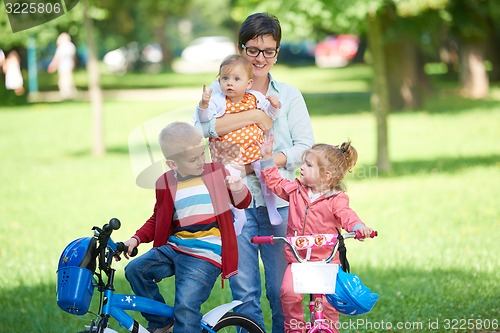 Image of happy young family in park
