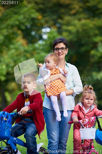 Image of happy young family in park