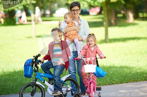 Image of happy young family in park