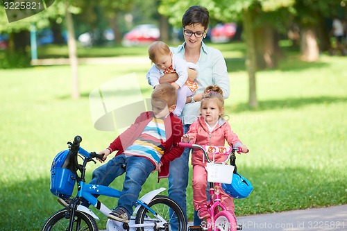 Image of happy young family in park