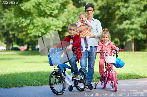 Image of happy young family in park