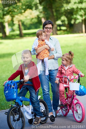 Image of happy young family in park