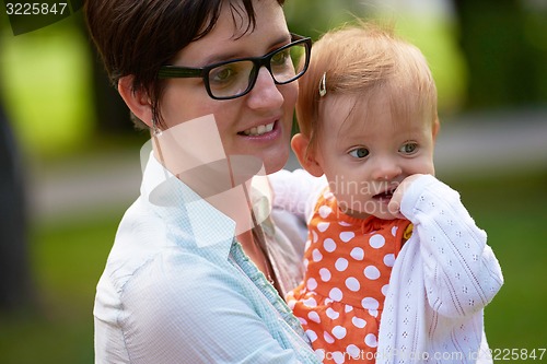 Image of mom and baby in nature