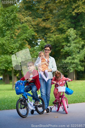Image of happy young family in park