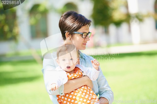 Image of mom and baby in nature